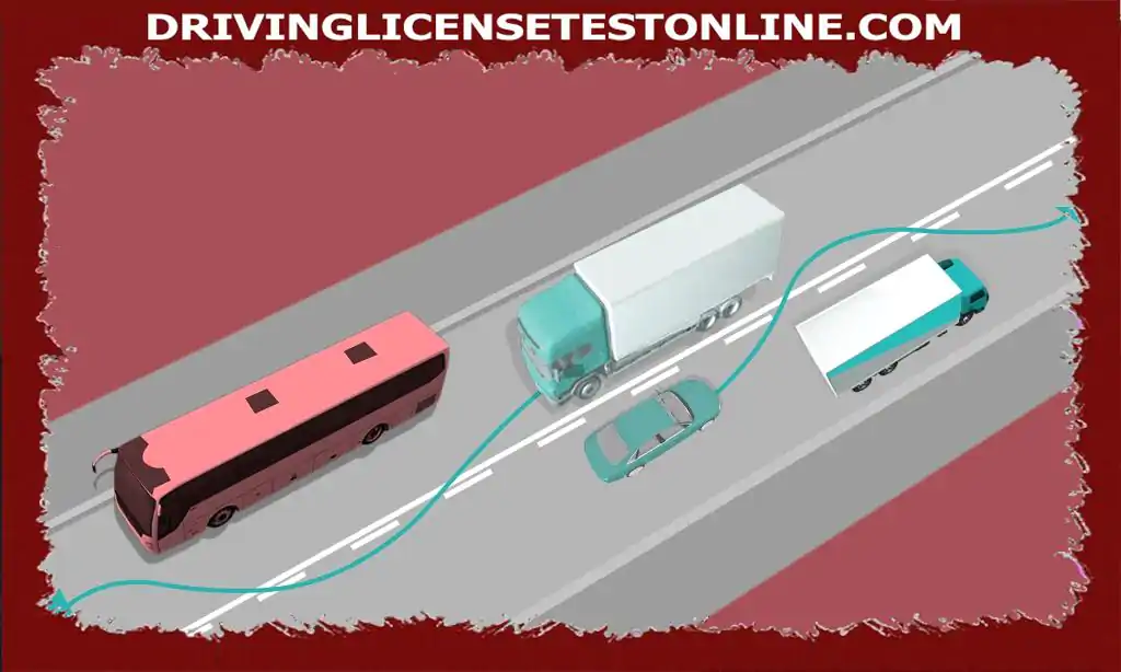 トラックが走行している車線には、2本の車線を反対方向に分割する実線が...