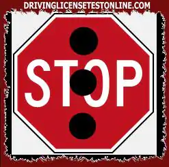 You see this sign at an intersection with traffic lights. What does ? mean?