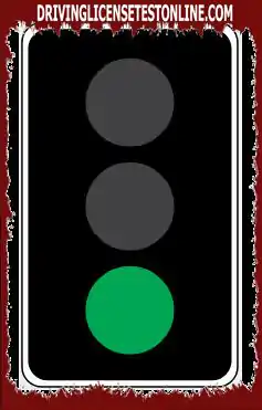 You have reached a set of green traffic lights. . When can you turn right ?