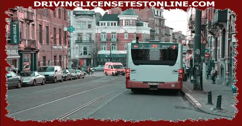In built-up areas, the driver of this bus turns on his flashing light . Do you have to give way to him ?