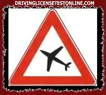 The sign shown is placed near runways for the landing and take-off of airplanes