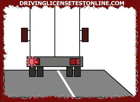 Conduce detrás de un vehículo de mercancías grande . ¿Qué debe hacer si hace una señal a...