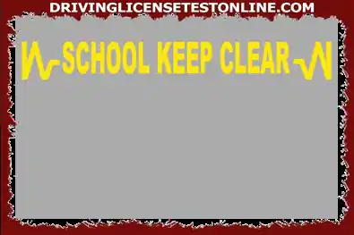 O que significam as linhas em ziguezague amarelas na estrada fora de uma escola ?