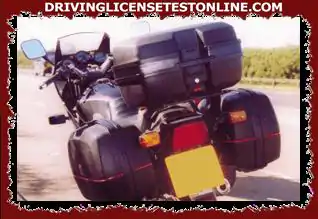 What can be caused by heavy load on the upper box of motorcycle ?