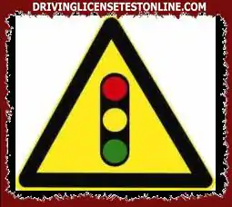 The meaning of this sign is to warn vehicle drivers to pay attention to the signal lights ahead.