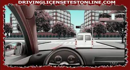 As shown in the picture, when passing the intersection in this case, what is the reason for not to overtake?