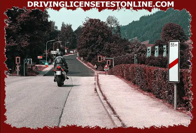 Are you allowed to overtake the motorcyclist after the level crossing ?