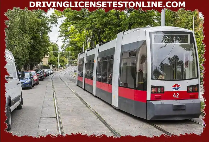 The tram travels at around 20 km / h . What dangers must be observed when overtaking this tram ?