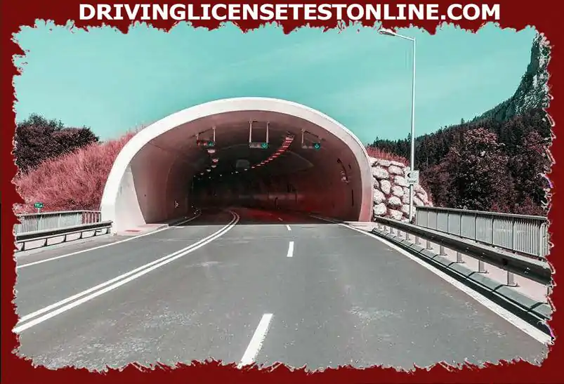 You are driving into this well-lit tunnel . How do you behave ?