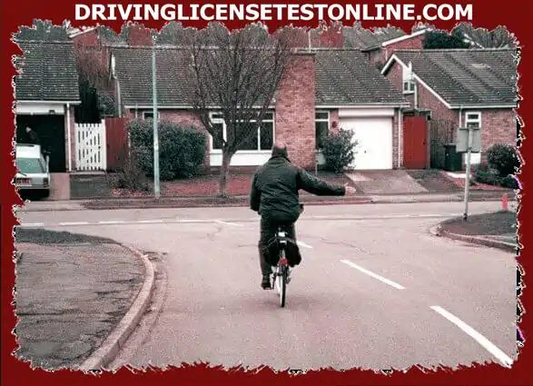 你正在接近這個騎自行車的人.你應該怎麼做?
