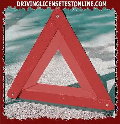 I got stuck on a two-way street. You have a warning triangle. At least how far away should...