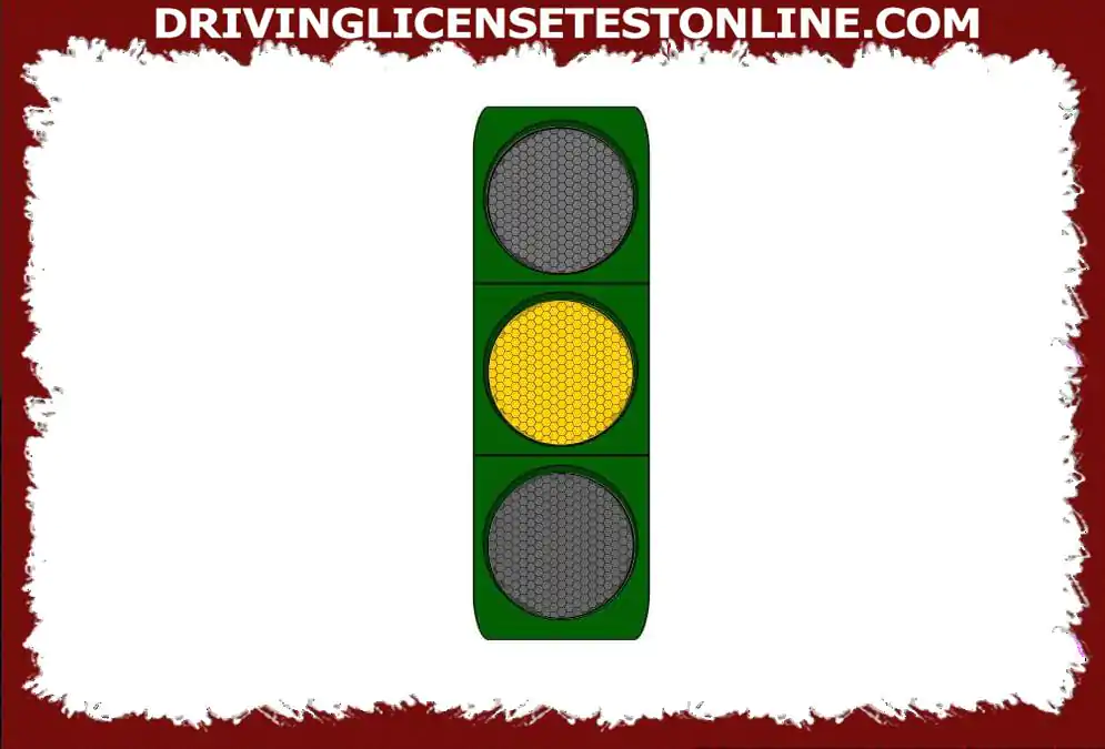 With your motorcycle , what should be your behavior before a fixed yellow traffic light ?