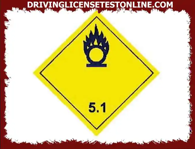 If a vehicle is driving in front of us with the label 5 . 1 on its rear, what type of material is transporting ?