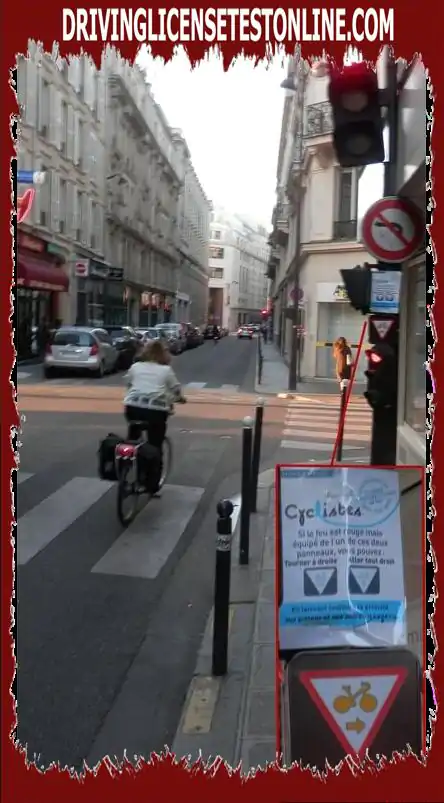 In Paris, does this cyclist have the right to run the red light to turn right ?