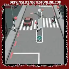 What should you do when you approach a pedestrian crossing with a raised traffic island in...