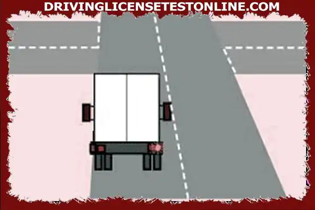 You are following a long vehicle approaching an intersection. The driver points right but...