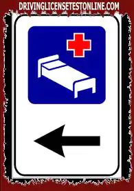 Parādītā zīme | kas norāda slimnīcas tuvumu, aicina tās tuvumā netraucēt