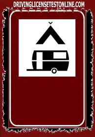 The sign shown indicates | the proximity of a camping area