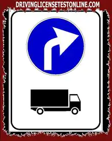 The sign shown | heralds a mandatory sign to turn left for all trucks