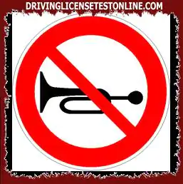 Road signs: | In the presence of the sign shown, the use of the horn is only permitted in the...