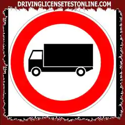 Road signs: | In the presence of the sign shown, the transit of all lorries with bodywork with...