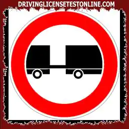 Traffic signs: | In the presence of the sign shown, the transit of a car towing a caravan is allowed