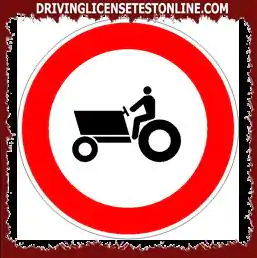 Road signs: | In the presence of the sign shown, the transit of agricultural machinery is...