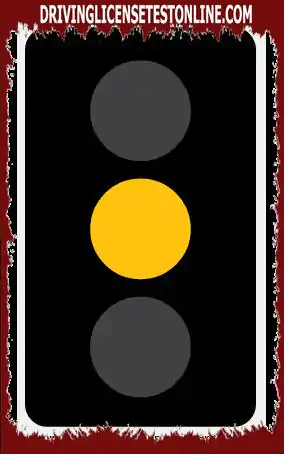 What to do when you reach a yellow light that is not blinking ?