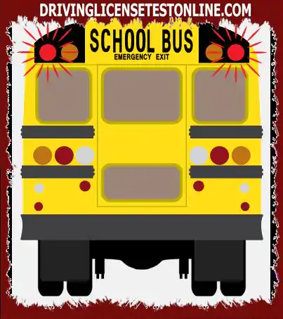 I stopped behind a school bus with flashing red lights. When can you pass ?