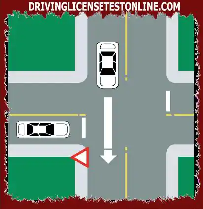 Al acercarse a una intersección controlada por una señal de ceder el paso, ¿qué debe hacer? ?