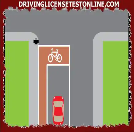 You reach a red traffic light with a bike lane and two stop lines. You must stop