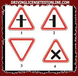 下列標誌中哪個是警告接近等量道路交叉口的標誌 :