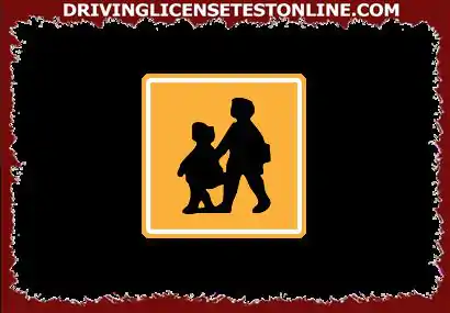 When transporting an organized group of children, the car is marked with this identification sign placed