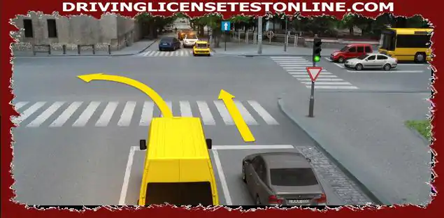 Which car driver is prohibited from moving in the direction of the arrow on this traffic light signal , if the carriageway is blocked by vehicles after the intersection ?