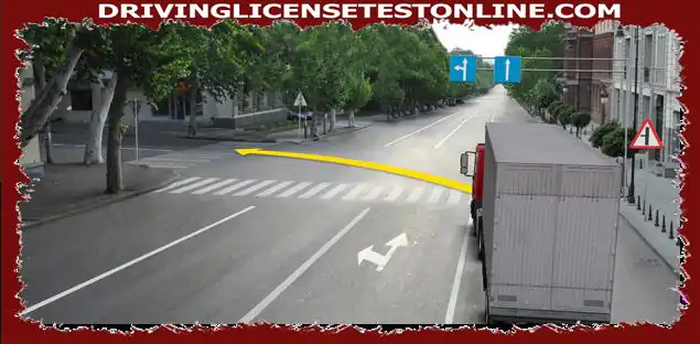 Is the driver of a truck , allowed to continue moving in the direction of the arrow , if the...